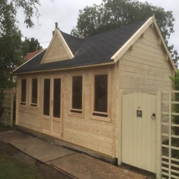CLOCKHOUSE LOG CABIN